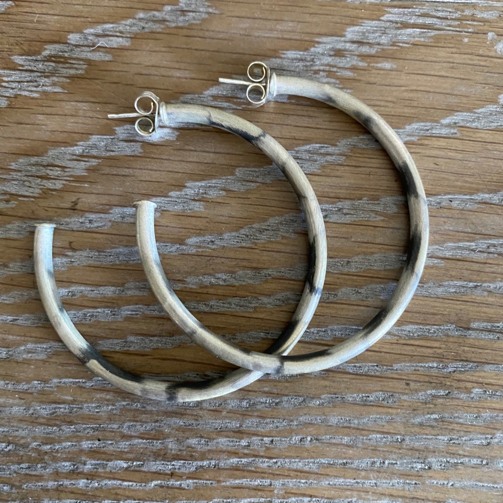 Sheila Fajl burnished silver hoops.